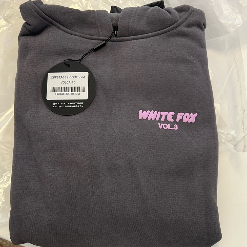 Brand New White Fox Boutique hoodie. Size S/M. Color: Volcanic. Original bag.